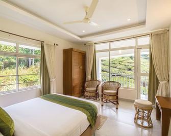 Monsoon Grande - Munnar - Schlafzimmer