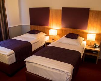 Hotel Niederrad - Frankfurt - Soveværelse