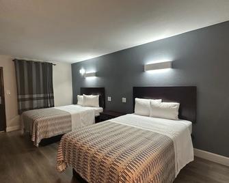 Western Inn Carrollton - Carrollton - Спальня