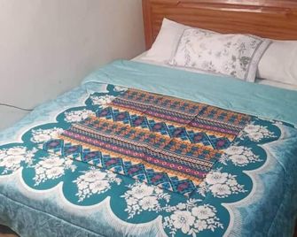 Pagershome Suites- Rustic - 基加利 - 臥室