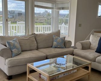 Beach is just steps away! Private path from upscale family home! Booking 2026! - Block Island - Living room