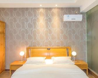 Jue Se Garden Theme Inn - Dali - Chambre