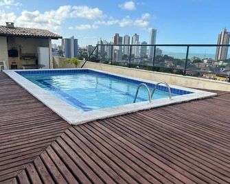 Flat with balcony, lush views, 1 bedroom, fitted kitchen. - Natal - Piscina