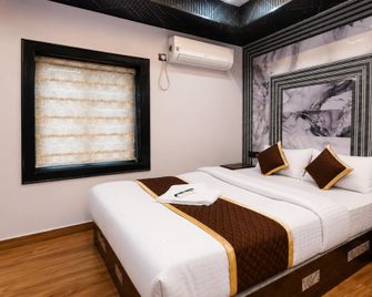 Hotel Nsk Grand Kunuru - Віджайавада - Спальня
