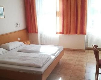 Pension Fünfhaus - וינה - חדר שינה