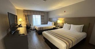 Country Inn & Suites by Radisson Grand Rapids Air - Cascade - Bedroom