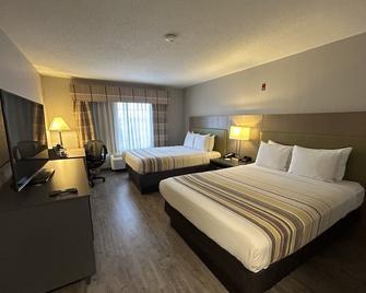 Country Inn & Suites by Radisson Grand Rapids Air - Cascade - Bedroom