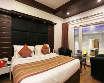 OYO 3911 Hotel Milestone Inn And Spa - Dehradun - Bedroom