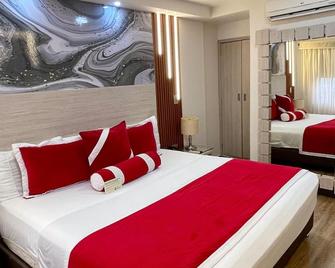 Cabecera Country Hotel - בוקאראמנגה - חדר שינה