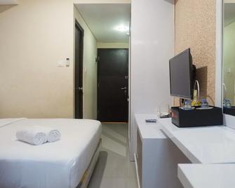 Compact Studio Room At Tamansari Papilio - Surabaya - Bedroom