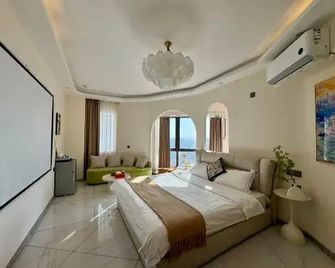 Harbin Time Stay Apartment - Harbin - Bedroom