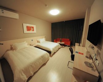 Jinjiang Inn - Nanchang Nanjing West Road - נאנצ'אנג - חדר שינה