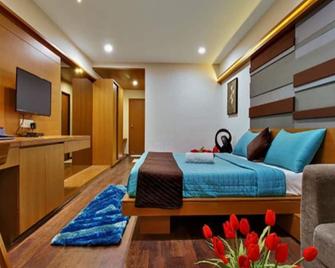 Aarya Grand Hotels & Resorts - Ahmedabad - Bedroom