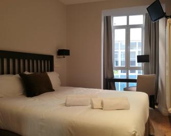 Hotel Cuéntame La Puebla - Burgos - Schlafzimmer