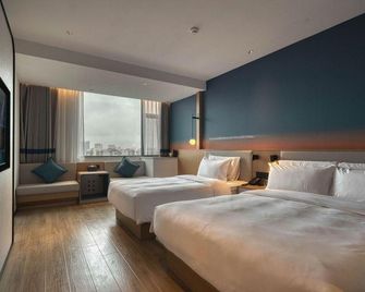 Grace Inn Weifang Xinhua Road - Weifang - Makuuhuone