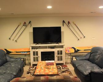 Basement Vacation Rental Near Skiing, Hiking, Weber State. 1.5 Acres Secluded! - Ogden - Living room