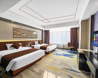 Platinum Apartment Hotel (Zhongshan Guzhen International Lighting Center) - Zhongshan - Κρεβατοκάμαρα
