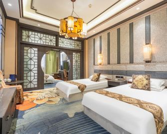 Jinxiu Jinhua Hotel - Turfán - Habitación