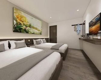 Saigon Nam Long Hotel - Ciudad Ho Chi Minh - Habitación