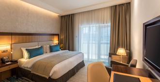 Golden Tulip Media Hotel - Dubai - Makuuhuone