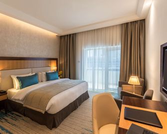 فندق جولدن تولب ثانية للشقق الفندقية - دبي - غرفة نوم