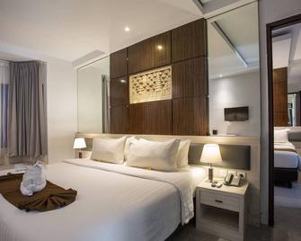 Famous Hotel Kuta - Kuta - Bedroom