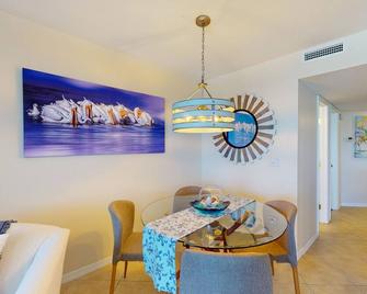 Stunning oceanfront condo with pool, balcony, AC, W/D, & exquisite water views - Ponce Inlet - Dining room