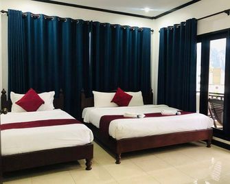 Central hotel Vang Vieng - Vang Vieng - Ložnice