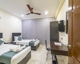 Hotel Athome & Serviced Apartments by Deccan Serai Hotels - Hyderabad - Bedroom