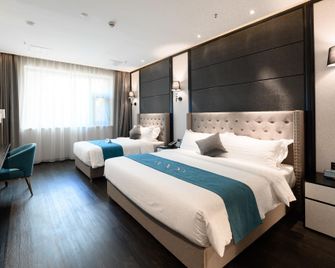 Xana Hotelle Jinzhou Central South Street Red Star Macalline - Jinzhou - Bedroom