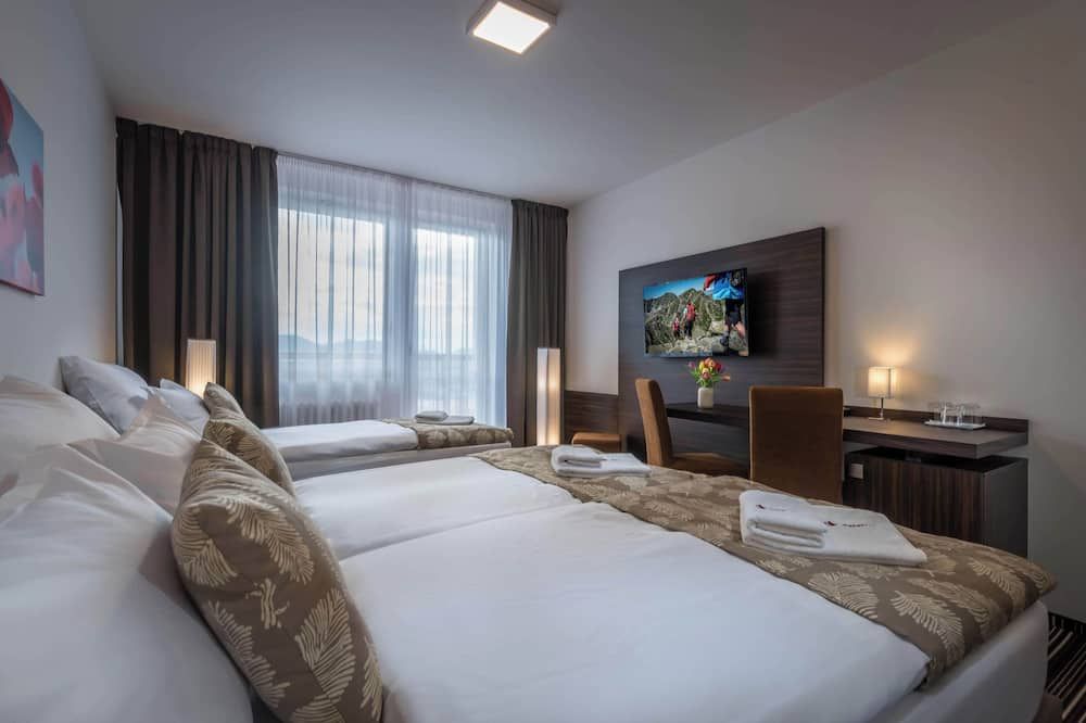Hotel Satel - פופראד - חדר שינה