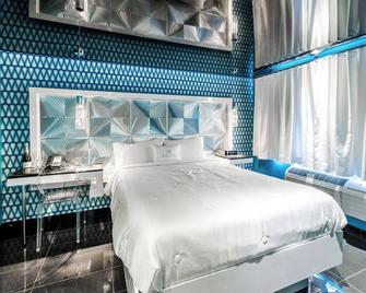 Olux Hotel-Motel-Suites - Laval - Bedroom