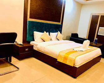 Goroomgo Hotel Reliance Jharkhand - Bokāro - Bedroom