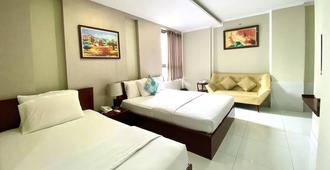 Mi Linh Hotel - Ho Chi Minh Stadt - Schlafzimmer