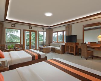 Sunrise Beach Hotel Pangandaran - Pangandaran - Living room