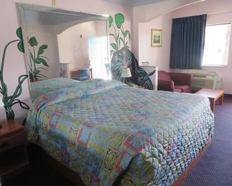 Travelers Inn and Suites Liberty - Liberty - Schlafzimmer