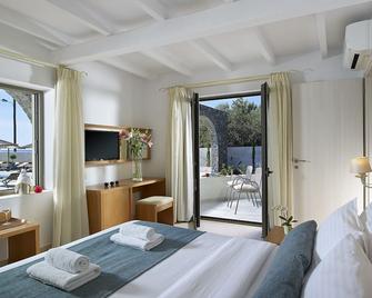 Coriva Beach Hotel & Bungalows - Koutsounára - Спальня