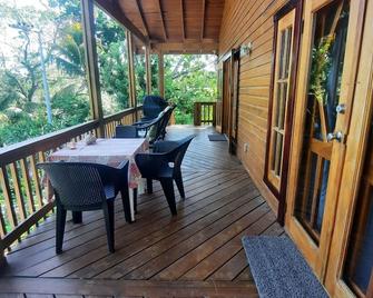Guava Grove Resort & Villas - Sandy Bay - Balcony