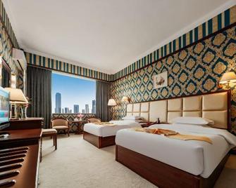 Longma Hotel - Honghe - Bedroom