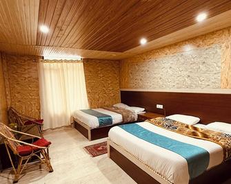 Hotel Yoga Badrinath - Badarīnāth - Habitación