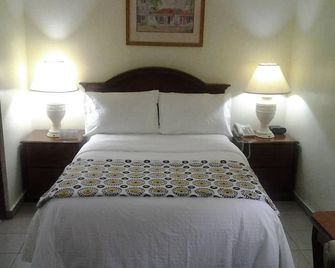 Micro Hotel Condo Suites - סנטו דומינגו - חדר שינה