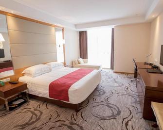 Zhenjiang Yinhong Business Boutique Hotel - Zhenjiang - Habitación