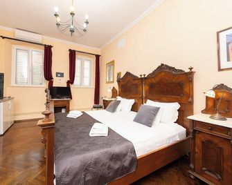 Amoret Apartments - Дубровник - Спальня