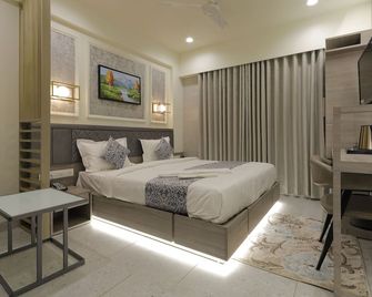 Hotel Elysian Residency - Ahmedabad - Habitación