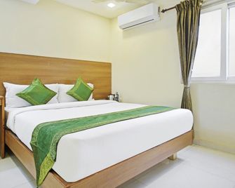 Itsy Hotels Jansi Residency - Koimbatur - Ložnice