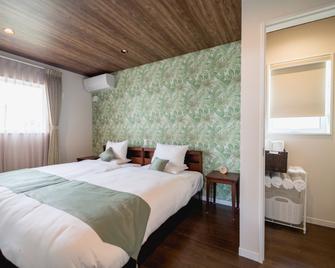 Beverly Hills Villa Miyakojima Resort - Miyakojima - Phòng ngủ