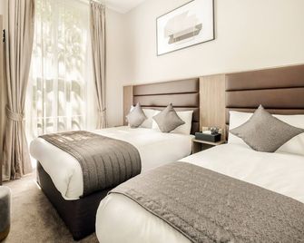 Reem Hotel - London - Schlafzimmer