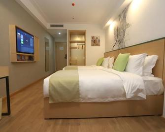 Vatica Zhoukou City Luyi County Zhenyuan Avenue Hotel - Zhoukou - Bedroom