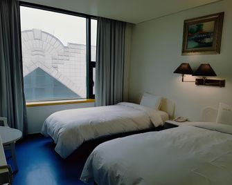 Dong Seoul Hotel - Seül - Habitació