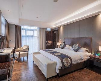 Zhuzhou Hujing Hotel - Zhuzhou - Schlafzimmer